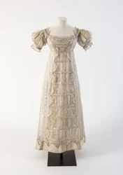 Cream silk gauze Madras lace frock with silk satin detail, 1817